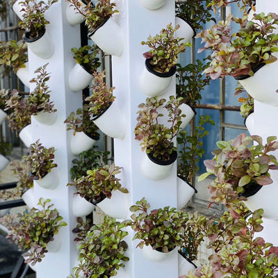 2023 Venta caliente de maceta de plástico jardín hidropónico vertical jardín artificial de pared maceta jardín vertical 112+ Plantas hidropónicas vertical